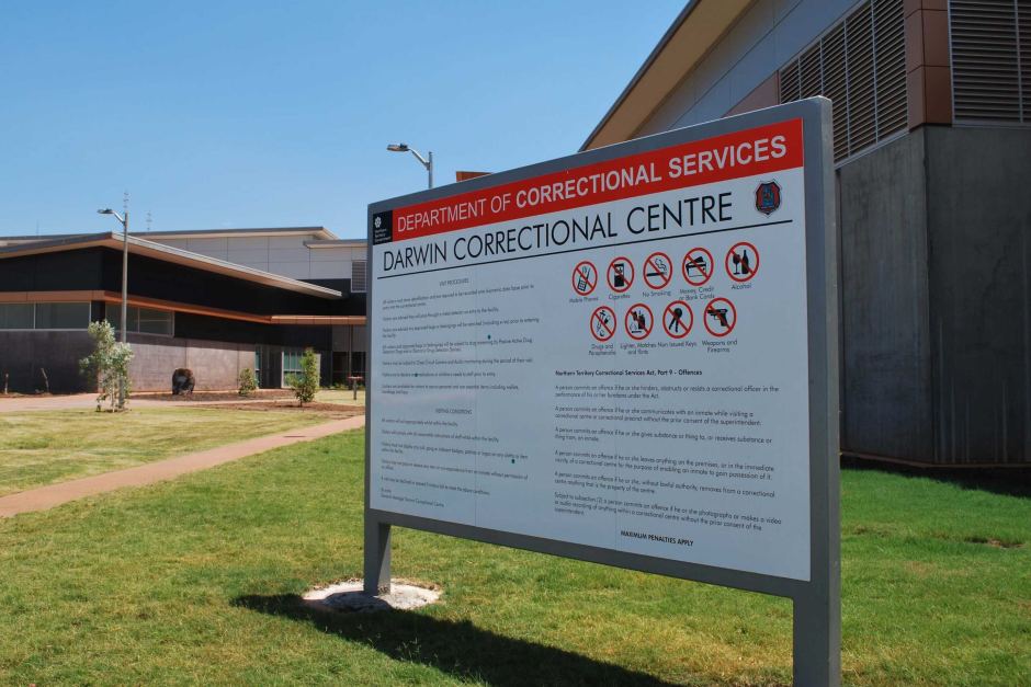 Darwin Correctional Centre building and sign showcasing Department of Correctional Services.