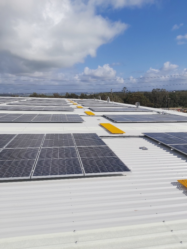 Dicker Data distribution centre roof with installed solar panels and roof safety systems.