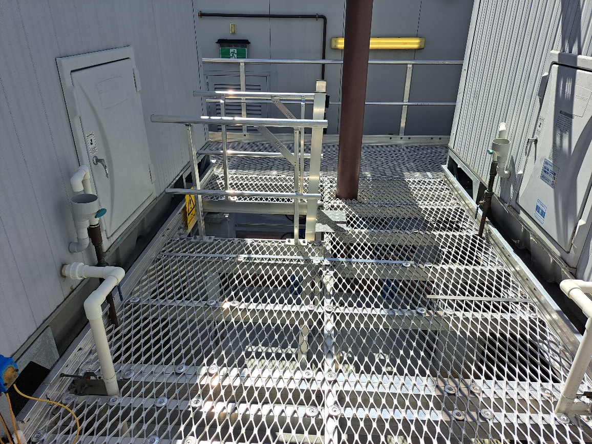 RISSafety height safety system on a rooftop illustrating compliance inspections and safety solutions.